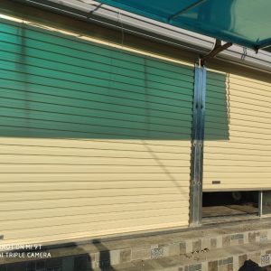 cửa cuốn tấm liền topdoor màu vàng k em